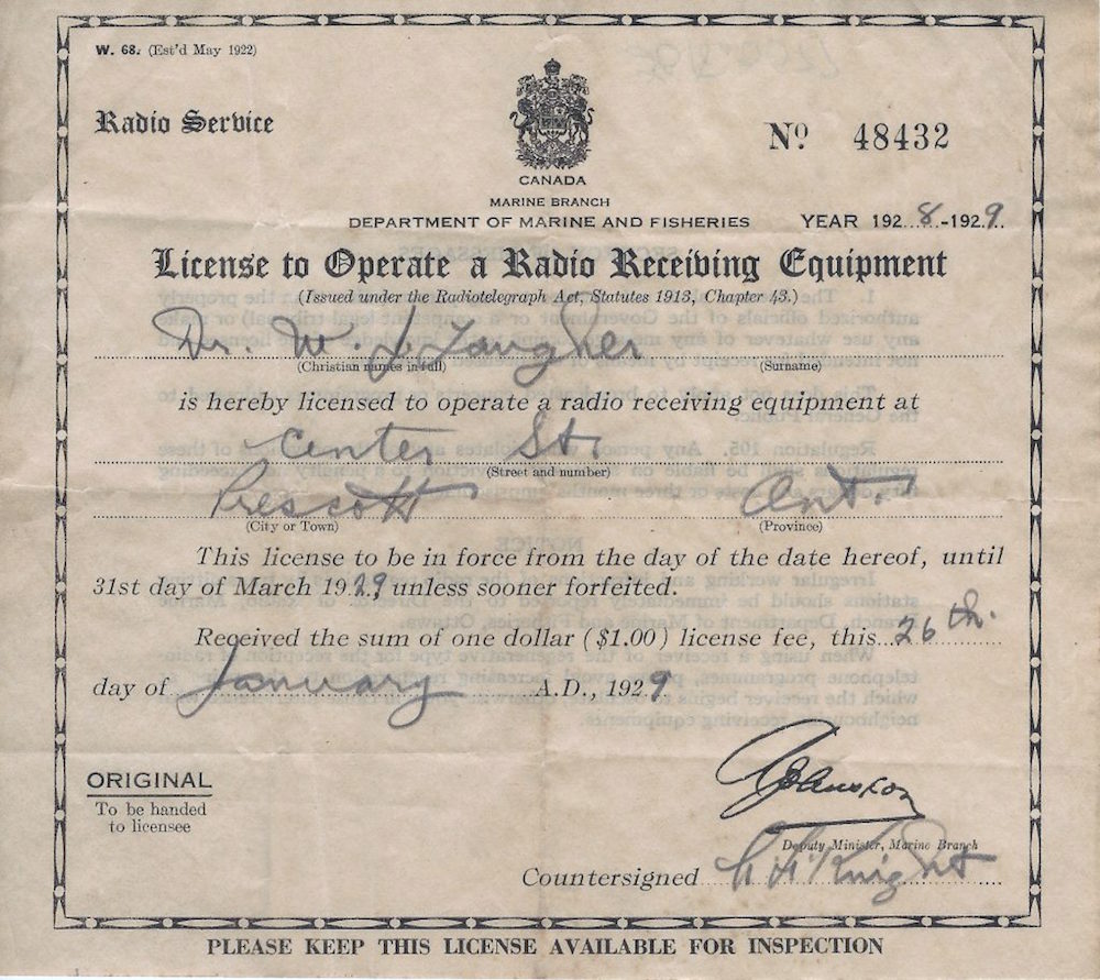 A simple decorative line frames this form which was completed in handwriting and signed by the government official and the user.