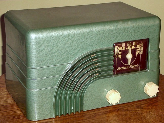 This is an image of a green Northern Electric 5000 radio from 1947. Otherwise known as the "Baby Champ."