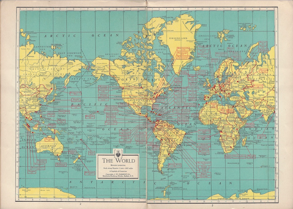 Double-sided map with the water shown in light blue, the continents in light yellow and red lines for the indication of the radio stations.