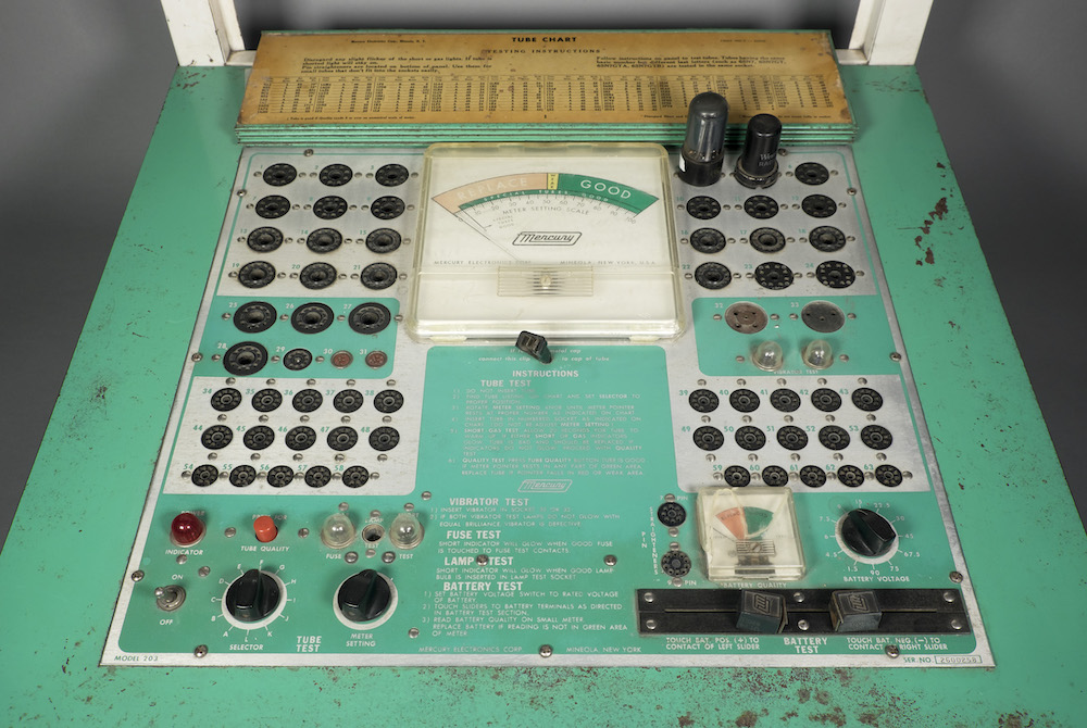 View of board with outlets to insert tubes for testing.