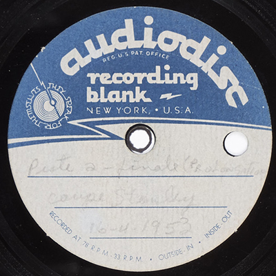 Paper label in white and blue of a recording blank vinyl disc used for the home recording of an excerpt of the 1953 Stanley Cup final game.