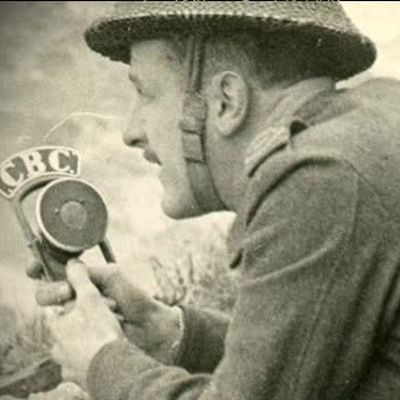 Black and white headshot of Marcel Ouimet holding a microphone reporting for the CBC from the frontline of World War II.