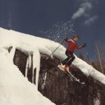 Unknown skier participating in Red Mountain Racers Cliff Jumping