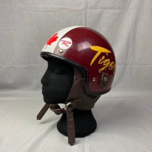 Red helmet with a white stripe and a maple leaf down the centre and Tiger written in yellow script on one side.