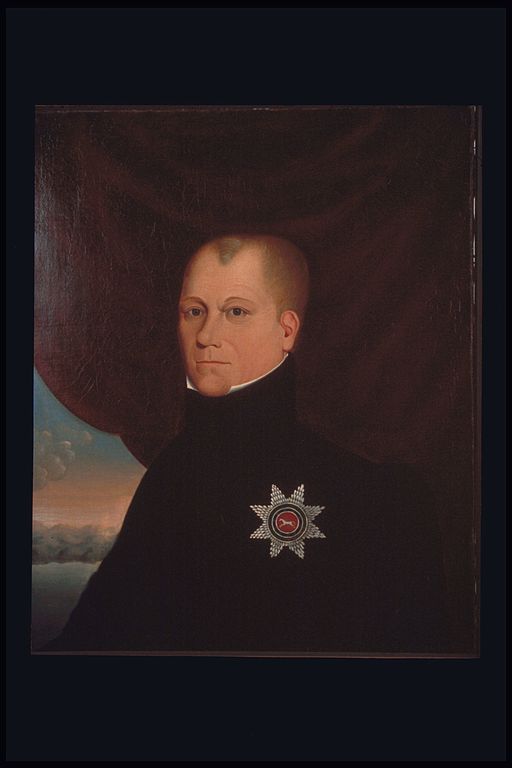 Painted portrait of a man wearing a simple black garment adorned with a large brooch of a horse in a red circle inside a silver star.