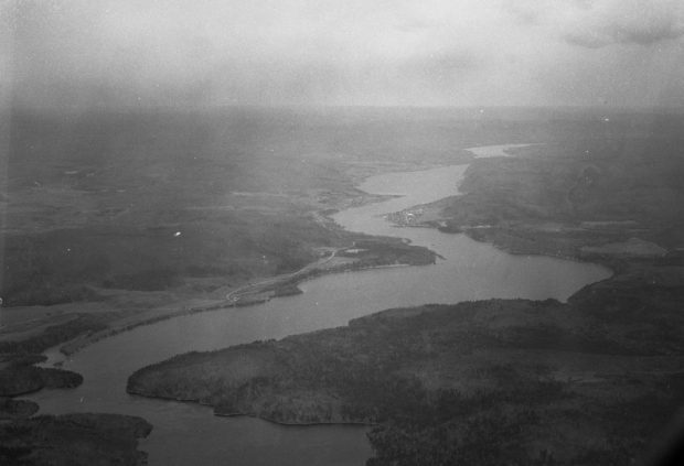 The Saint-Maurice River meanders through a misty landscape.