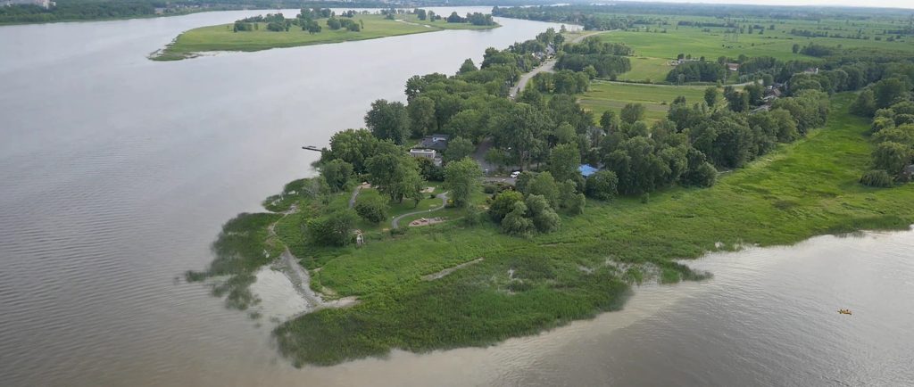 Colour aerial view of the eastern point of Île Jésus in summer. The Des Prairies River can be seen on the left and the Mille Îles River on the left. They meet at the bottom of the photo.