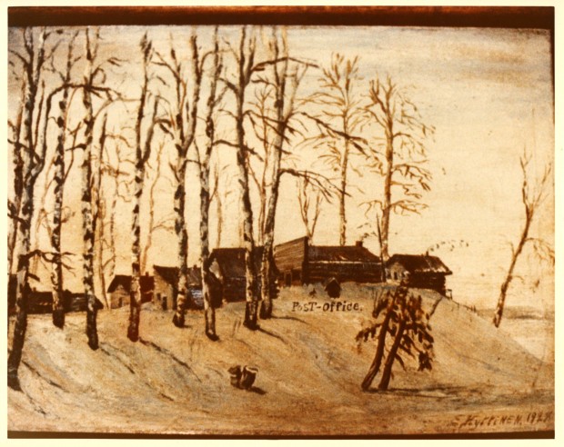 Sepia-toned photograph of seven log cabins on a hill covered with many trees. On the left you can see Osisko Lake.