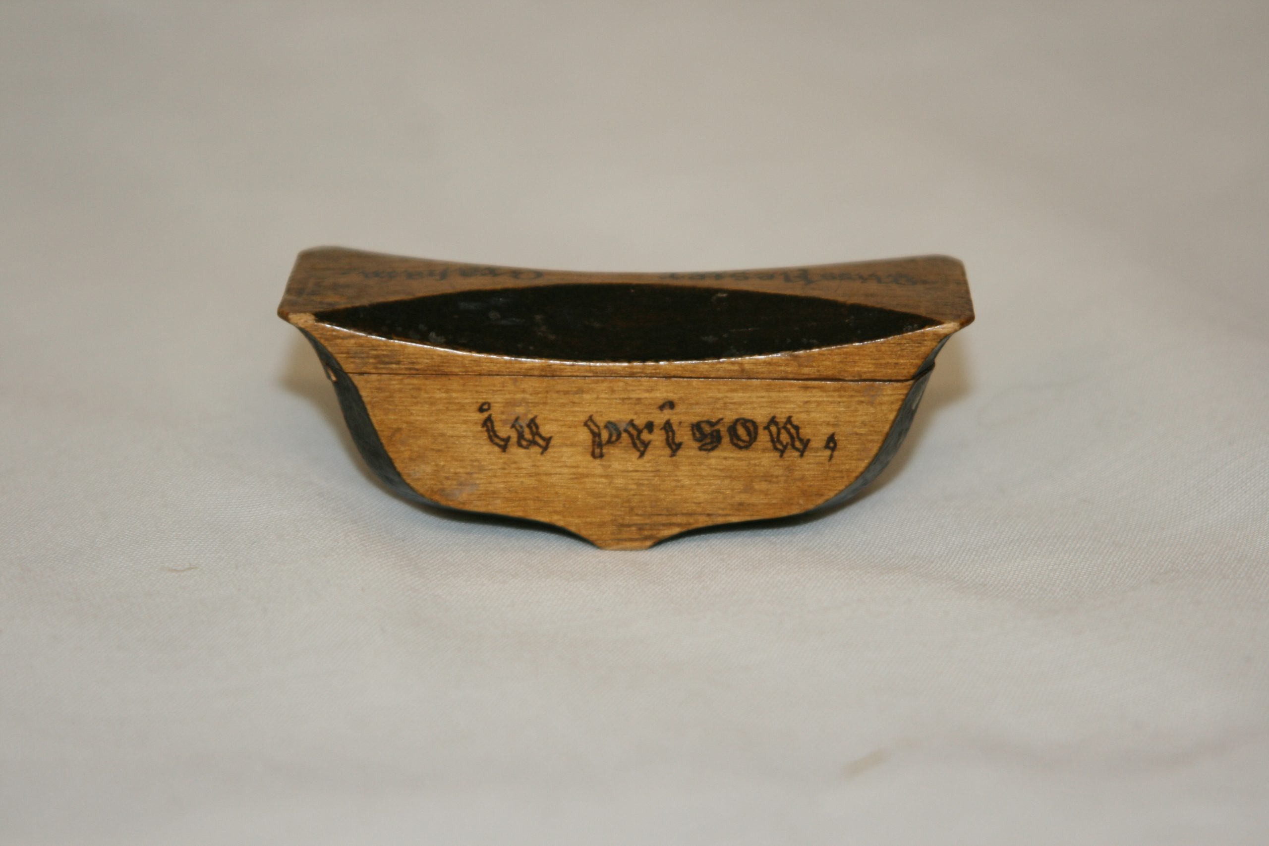 Rebellion box with black ink decor and a rocking bottom made by John Graham for his sister Miss Hester Graham.