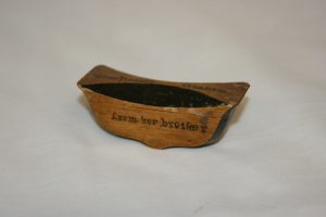 Rebellion box with black ink decor and a rocking bottom made by John Graham for his sister Miss Hester Graham.