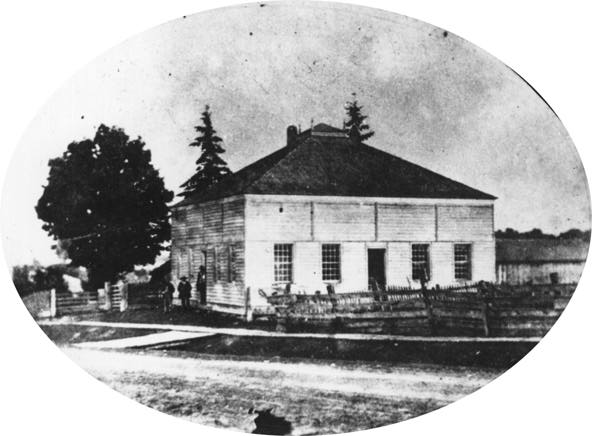 Illustration en noir et blanc montrant la première salle de réunion des Enfants de la paix. 