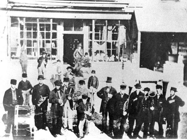 The Sharon Band lined up in front of the general store. Many members were also Children of the Peace.