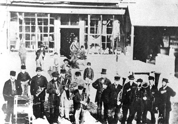 The Sharon Band lined up in front of the general store. Many members were also Children of the Peace.