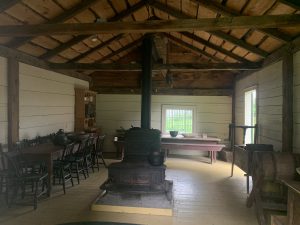 Interior of the cookhouse featuring the original stove used to prepare feasts.