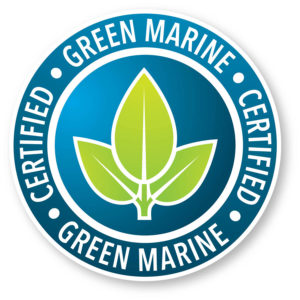 Logo with a circular design outlined in while and filled with blue a green leaf is in the centre. Text Green Marine Certified is written in white lettering.