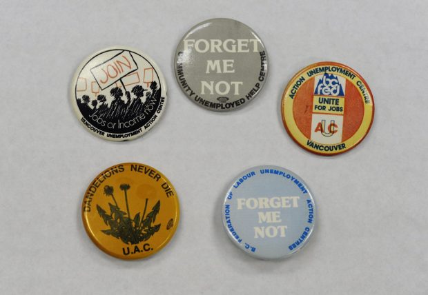 Five buttons produced by Unemployment Action Centres in Vancouver and BC are shown, with slogans such as “Dandelions Never Die”, “Unite for Jobs” and “Forget Me Not”.