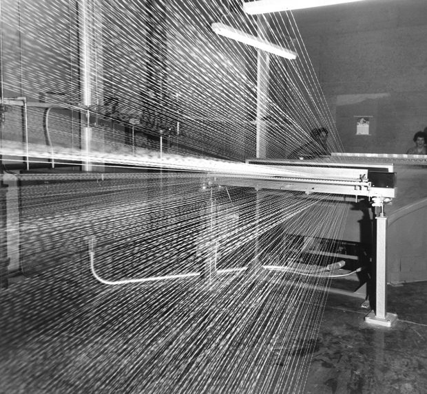Thousands of threads come out of a machine like laser beams.