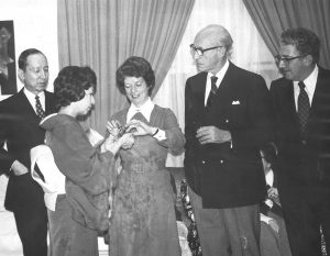 Group photo in black and white with three men and two women including one in a Japanese kimono