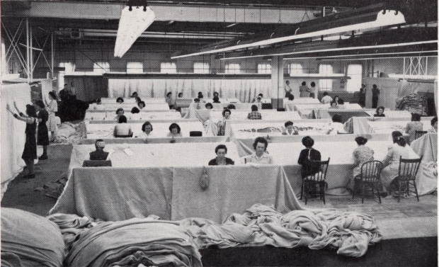 Black and white picture of women working on factory floor