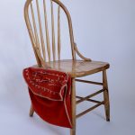 Chair with Attached Tool Pouch and Embroidered Name of Seamstress
