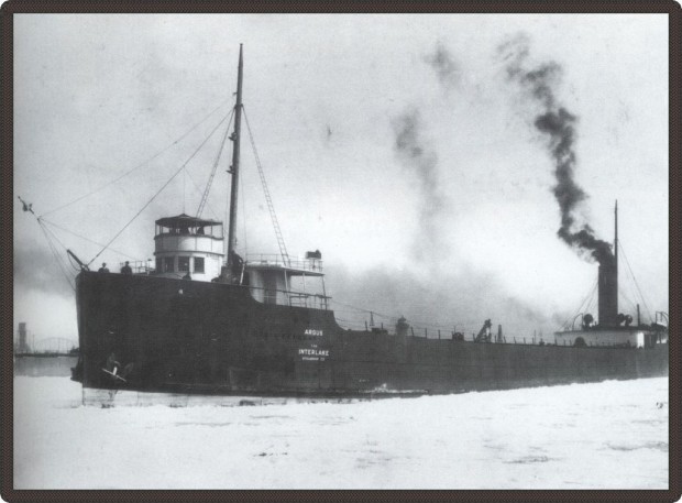 Black and white photo of a long steamboat