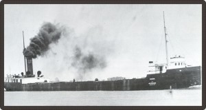 Black and white photo of a large steamboat