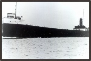 Black and white photo of a long boat