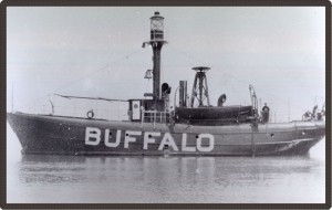 Black and white photo of a small boat on the water