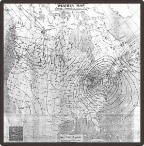 Photo en noir et blanc d’une carte du continent nord-américain. Plusieurs cercles concentriques peuvent être aperçus au-dessus du lac huron.