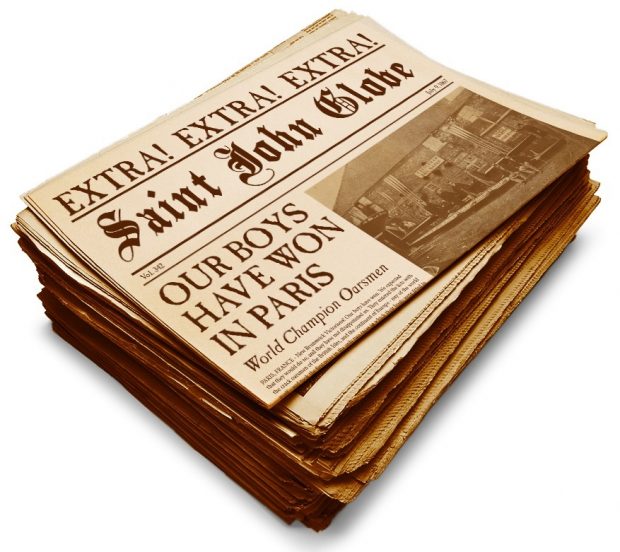 An image of a period-looking copy of the Saint John Globe newspaper from July 9, 1867. The top copy in the stack of newspapers is showing the front page with the headline Extra, Extra, Extra Our Boys Have Won In Paris. There is also a photo of the team members posing in front of a boathouse in Southampton England with their boat. There is a caption declaring the Paris Crew as world champion oarsmen.