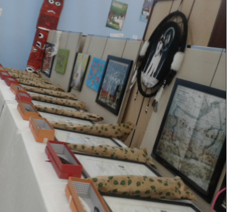 A coloured photo showing a table of gifts.