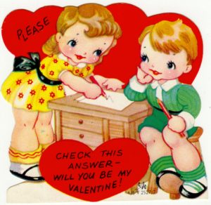 Old time Valentine card shows a boy and a girl and several hearts