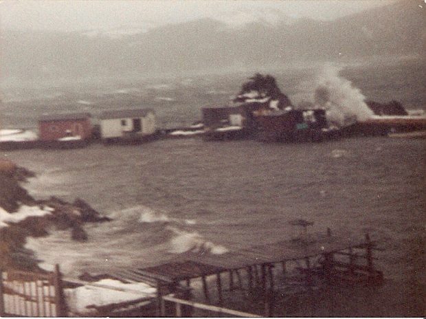 Seas crash over breakwater on a rough day in Parker's Cove