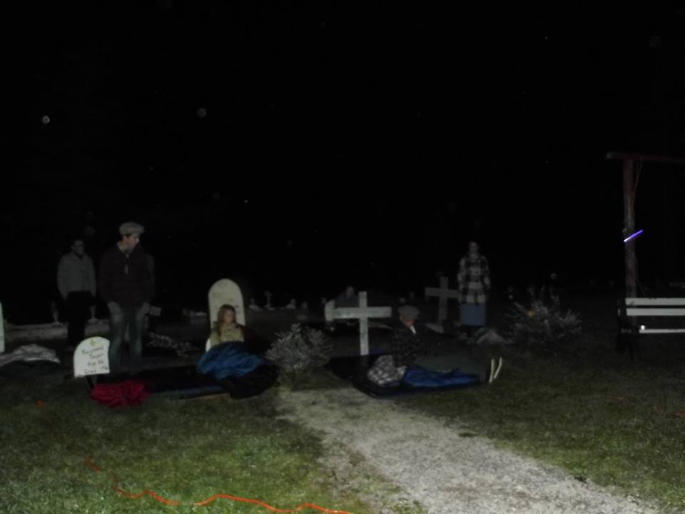 Souls rise from the graves in an outdoor performance of West Moon