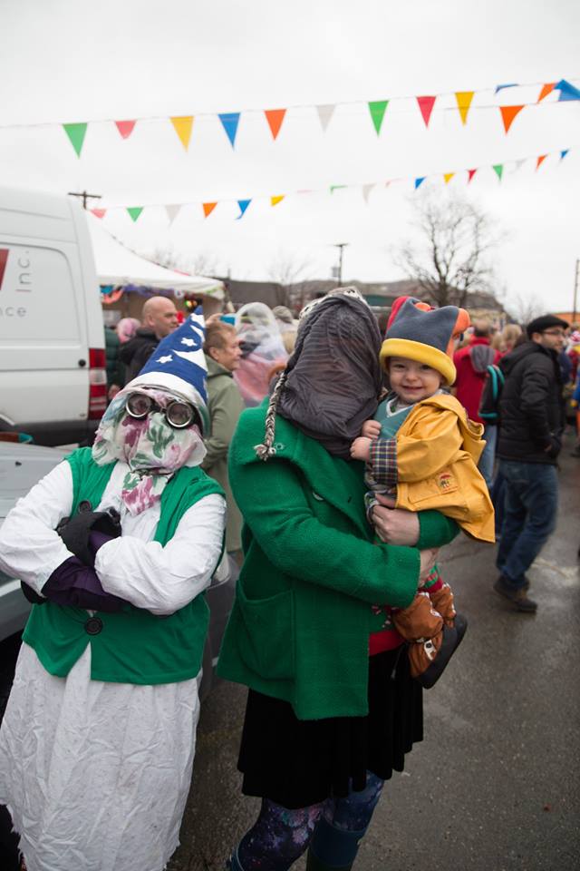 Two Mummers and a child on Parade