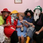 Mummers Having a Nip in Parker’s Cove