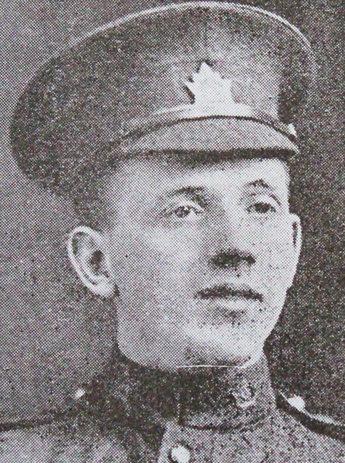 Portrait of a soldier wearing peak hat.