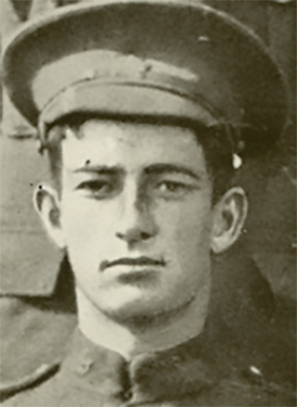 Portrait of a soldier wearing a peak hat.