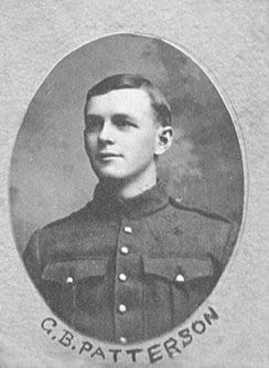 Portrait of a soldier in an oval mat with writings at the bottom, outside the photo.