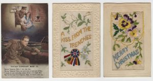 Three cards: a soldier in trenches dreaming of his sweetheart, writings at the bottom (on the right), a card made of embossed cardboard and embroidery (centre), a card made of embossed cardboard and embroidery (left).