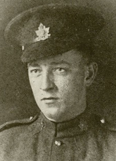 Portrait of a soldier wearing peak hat.