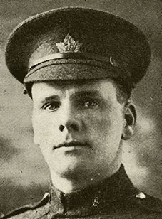 Portrait of a soldier wearing a peak hat.