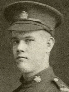 Portrait of a soldier wearing a peak hat.