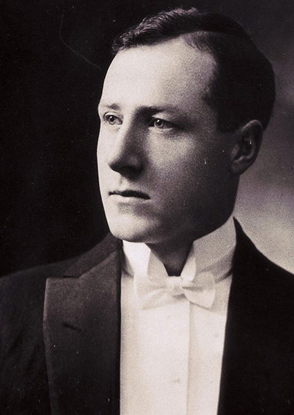 Portrait of a man in dinner dress, white tie.