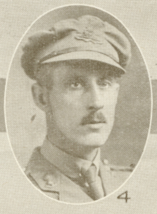 Portrait of a soldier wearing a peak hat. He has a moustache.