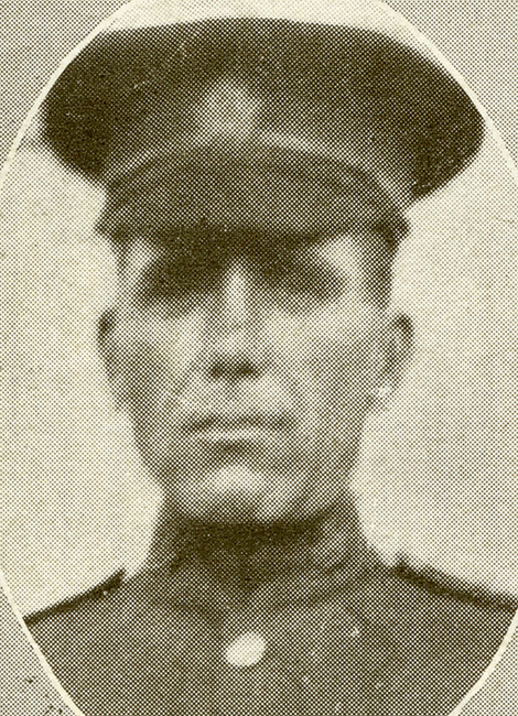 Portrait of a soldier wearing a peak hat.