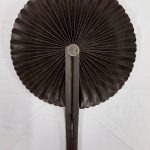 A black circular fan.