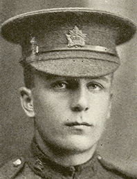 Portrait of a soldier wearing peak hat.