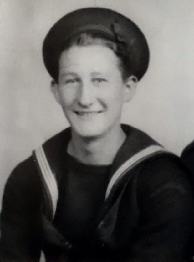 old photo of Navy sailor in uniform