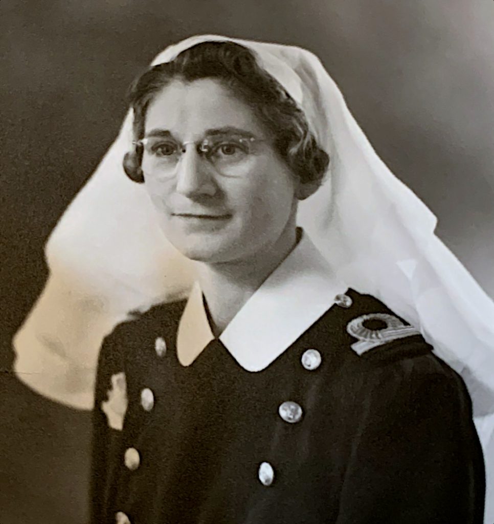 Young woman in glasses and naval officer's uniform